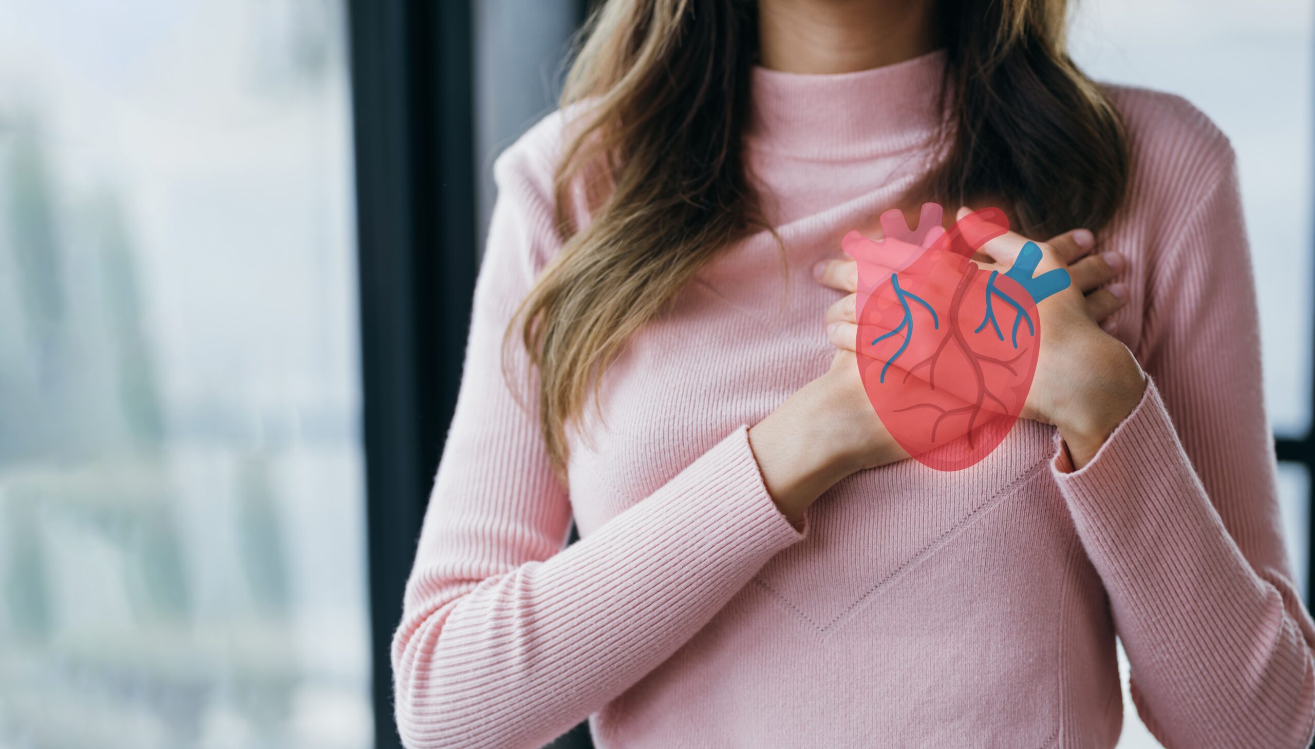 Woman holding her heart.